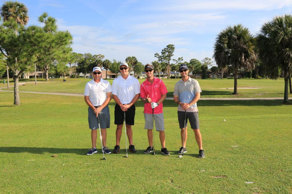 golfers together on the course