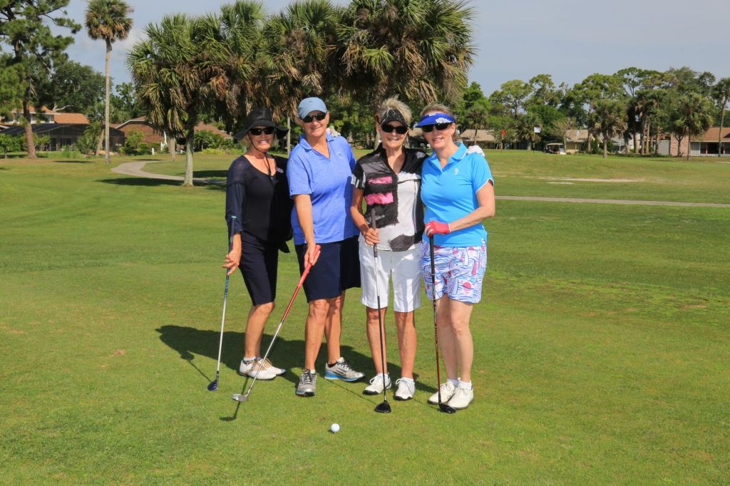 golfers together on the course